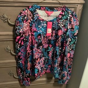 Lilly Pulitzer Jansen sweatshirt with pleated shoulders in color twilight coral.